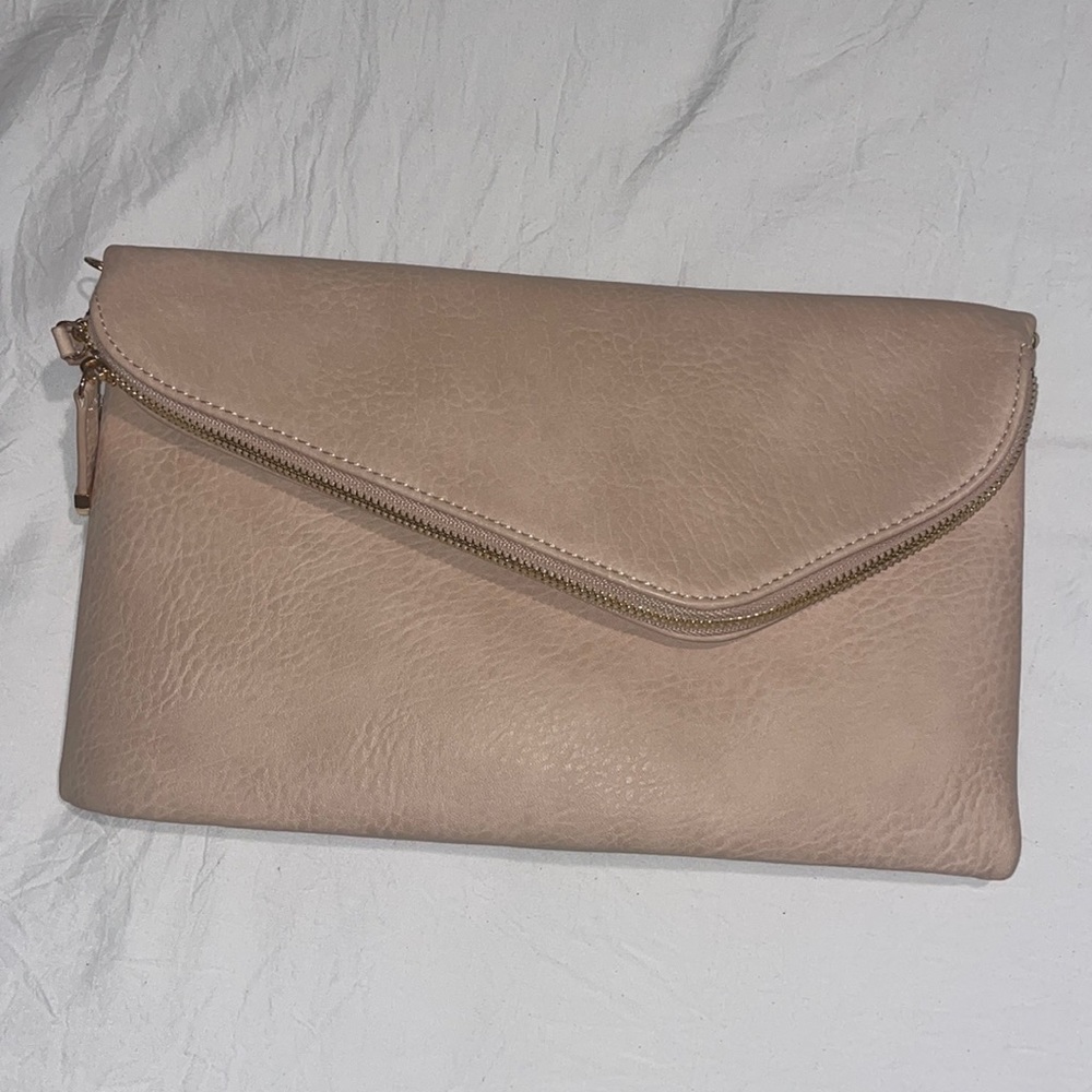 NWT flap/zip clutch